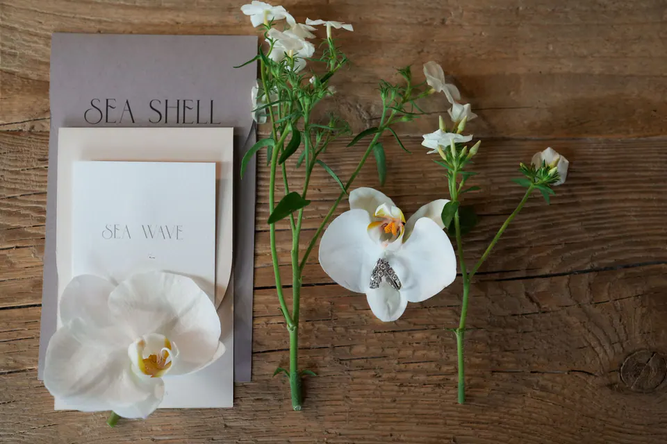 Orchid bouquet and wedding invitation, Umbria.
