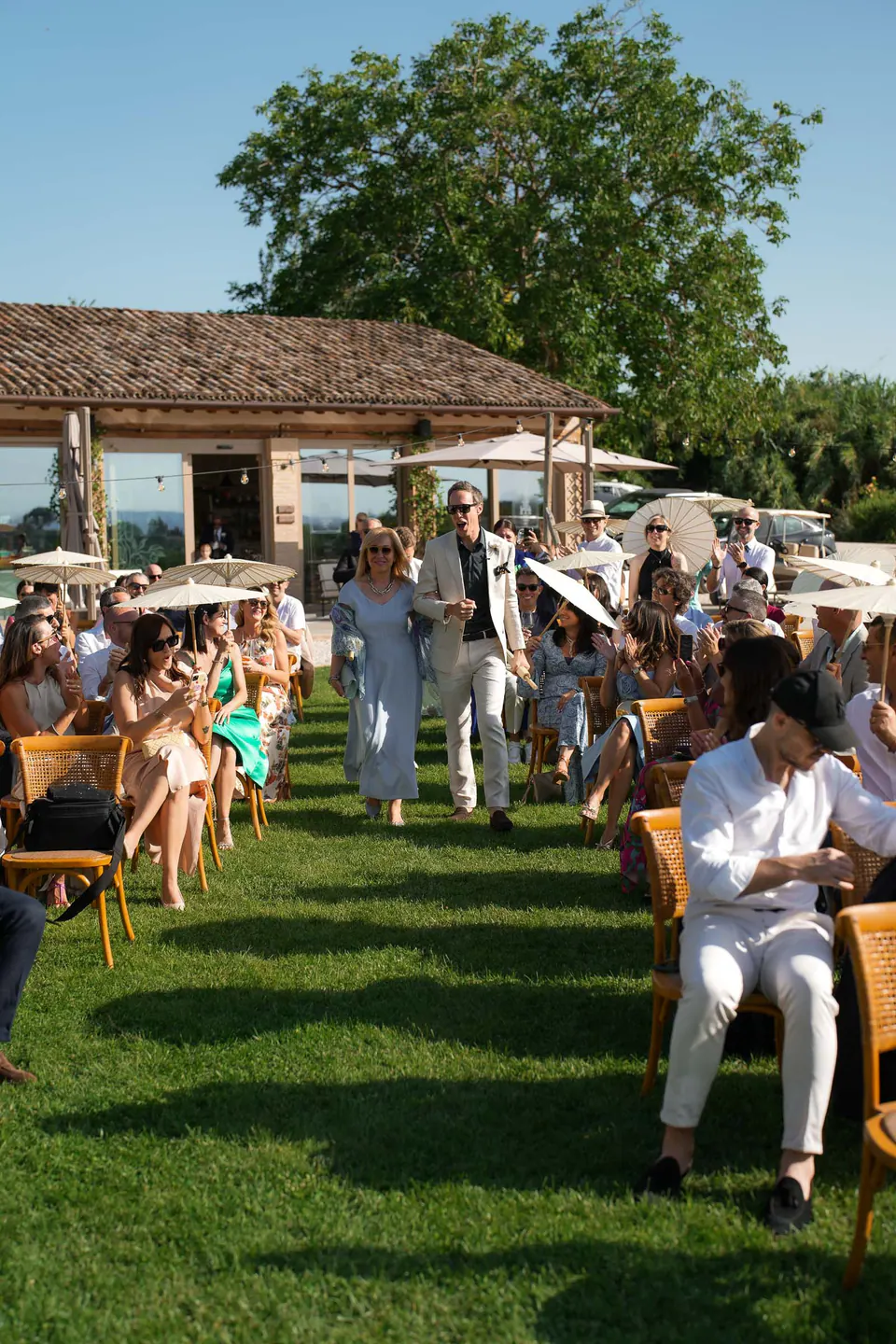 Guests seated on the lawn during the ceremony