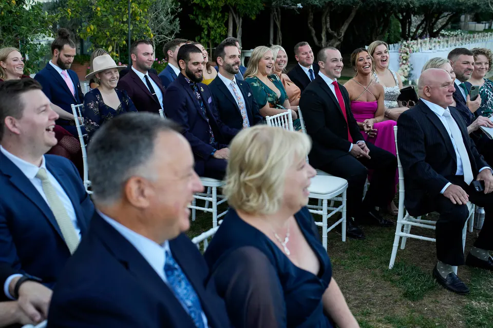 Guests watching the ceremony.