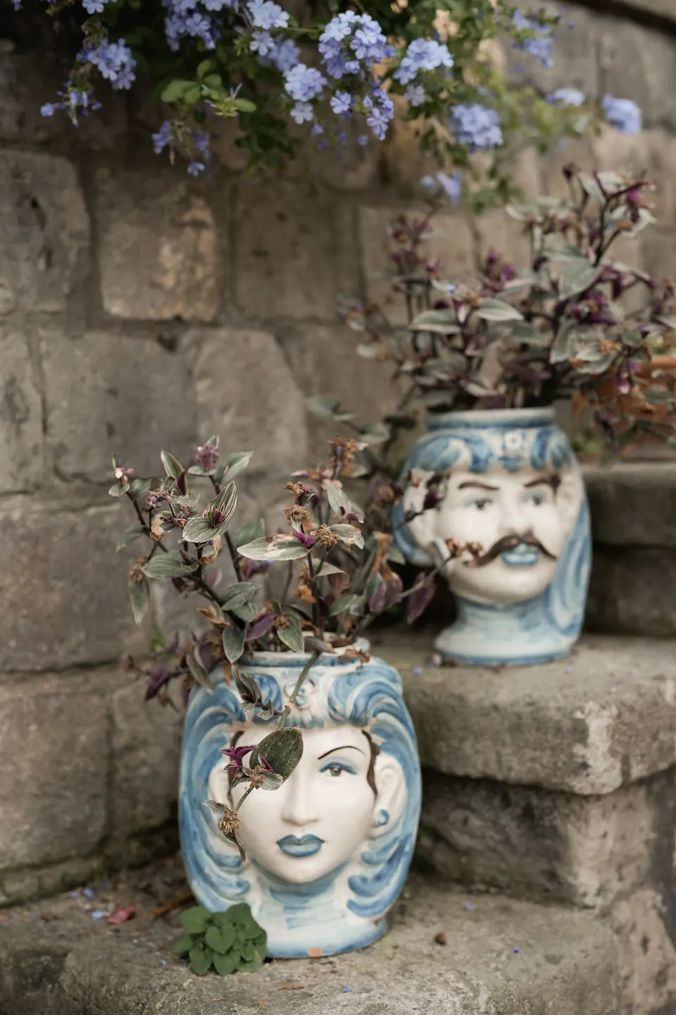 Artistic detail of Sicilian ceramic vases used as wedding decor.